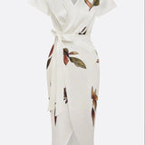 Elin | Elegancka sukienka kopertowa w kwiatowy wzór