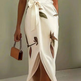 Elin | Elegancka sukienka kopertowa w kwiatowy wzór