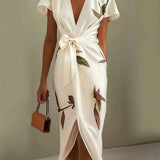 Elin | Elegancka sukienka kopertowa w kwiatowy wzór